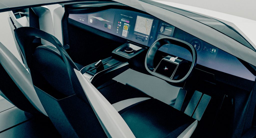 A rendering of the interior of the Apple Car, with a screen the length of the interior of the car.