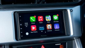 Aftermarket radio offering Apple CarPlay in a used car | Will Ireland/MacFormat Magazine/Future via Getty Images