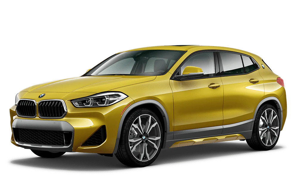 A gold 2022 BMW X2 on a white background