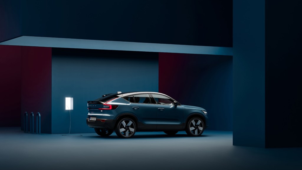 Blue 2022 Volvo C40 Recharge compact SUV EV parked in a blue room. Is it redesigned or new?