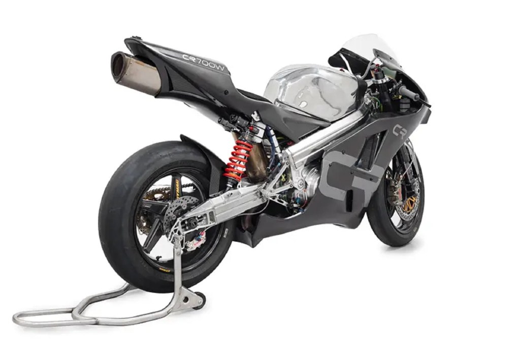 The rear 3/4 view of the carbon-fiber-bodied Crighton CR700W on a rear-wheel stand