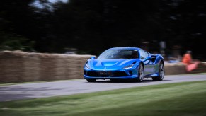 Ferrari F8 in blue on a racetrack