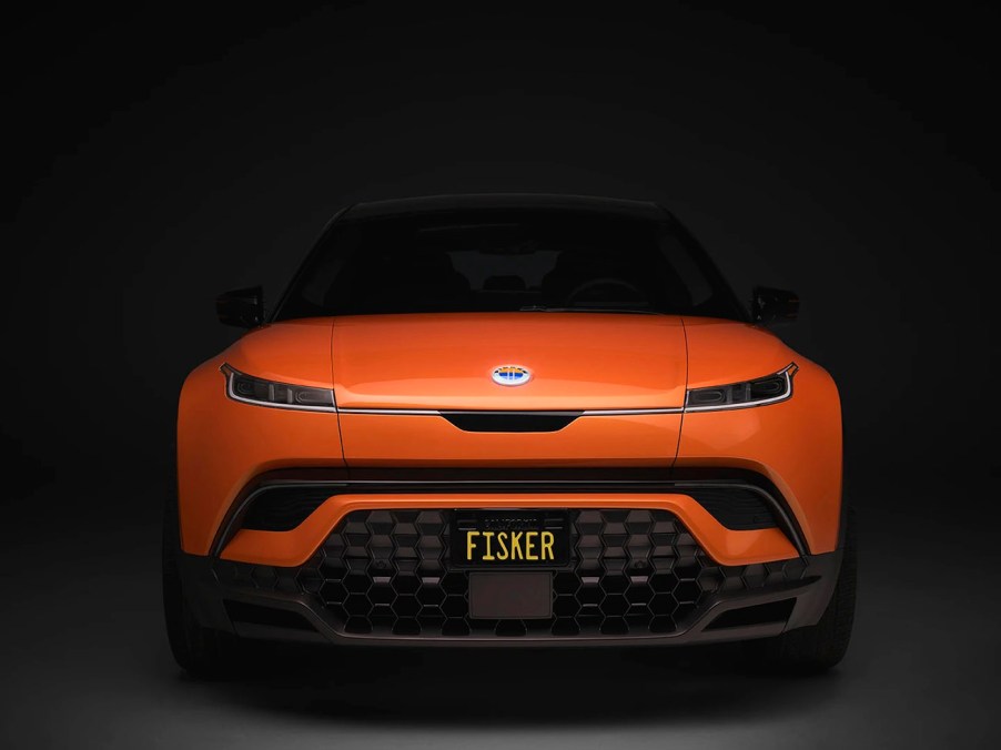 the Fisker Ocean SUV painted in orange seen from the direct front view