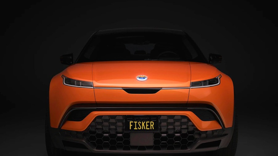 the Fisker Ocean SUV painted in orange seen from the direct front view