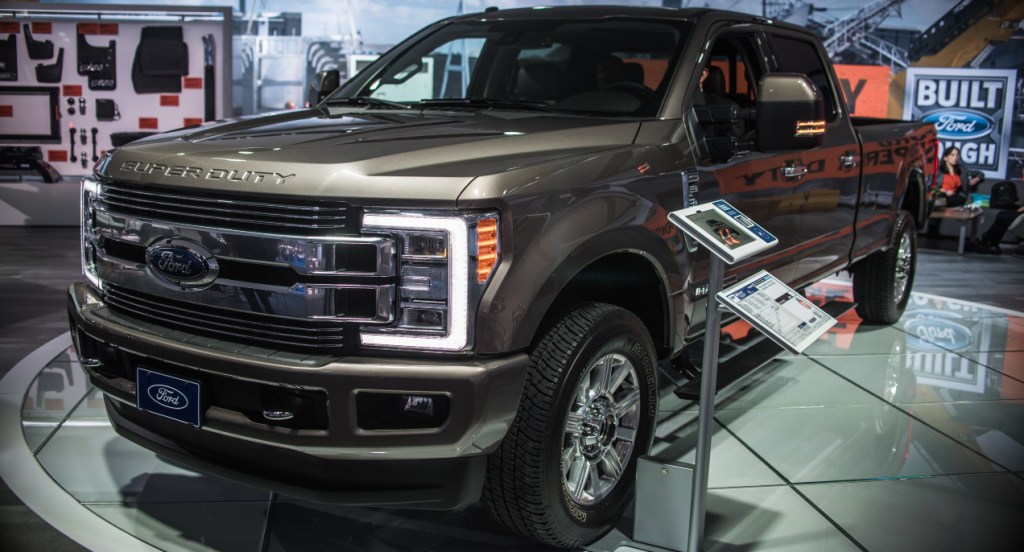 A brown Ford F-350 is on display.
