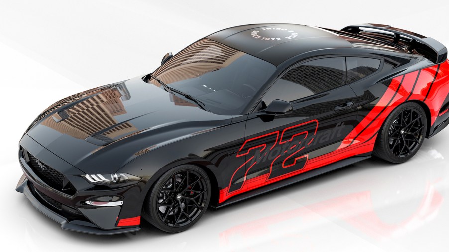This is a computer render of M2 Motoring's Mustang GT race car build. The Ford Mustang sports car won car of the year at SEMA 2021. | Ford