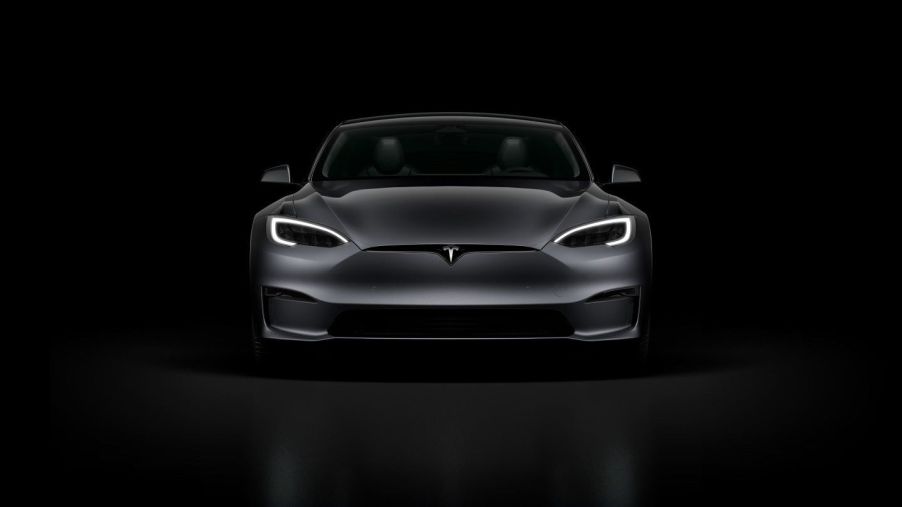 Front view of black Tesla Model S and Tesla Sentry Mode with Darth Vader voice feature