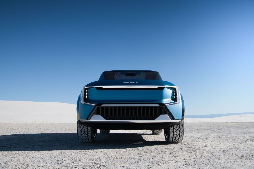 Front view of blue-green 2024 Kia EV9 electric SUV