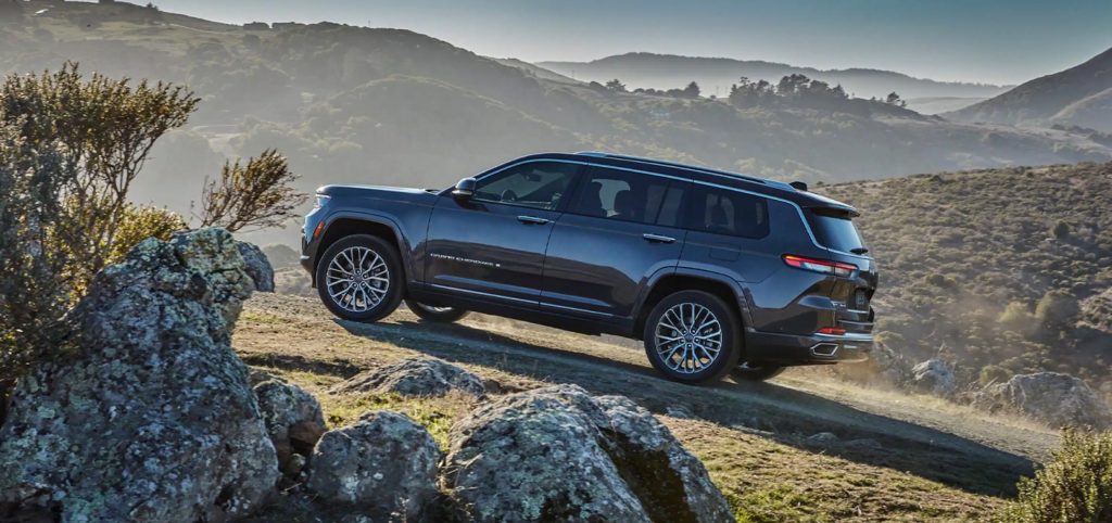 2021 Jeep Grand Cherokee L in grey on a mountain