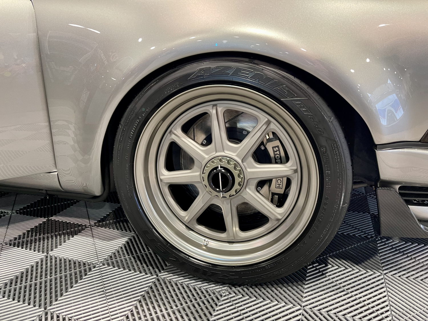The CSF Cooling Porshe 911 has three-piece wheels by Rotiform