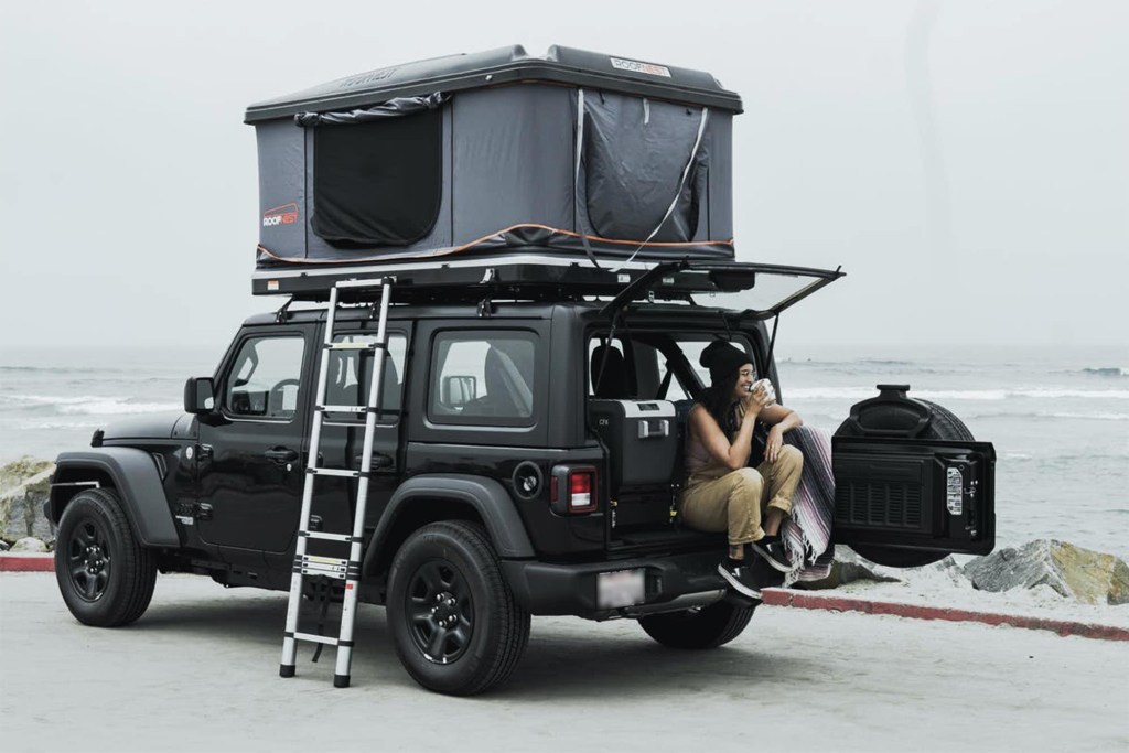 Indie Camper's Rocky Jeep Wrangler Unlimited Sport with rooftop tent
