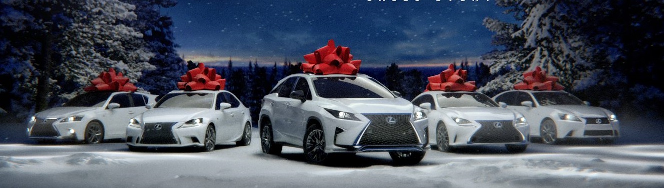 A white Lexus SUV and cars with red Christmas bows on top.