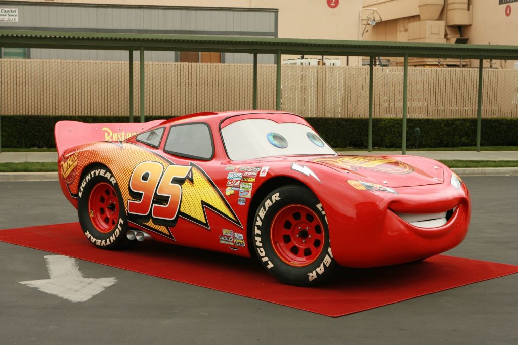 Lightning McQueen from Cars parked on a red carpet