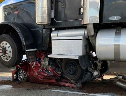 Woman Receives Minor Injuries When Semi-Truck Flattens Her Altima