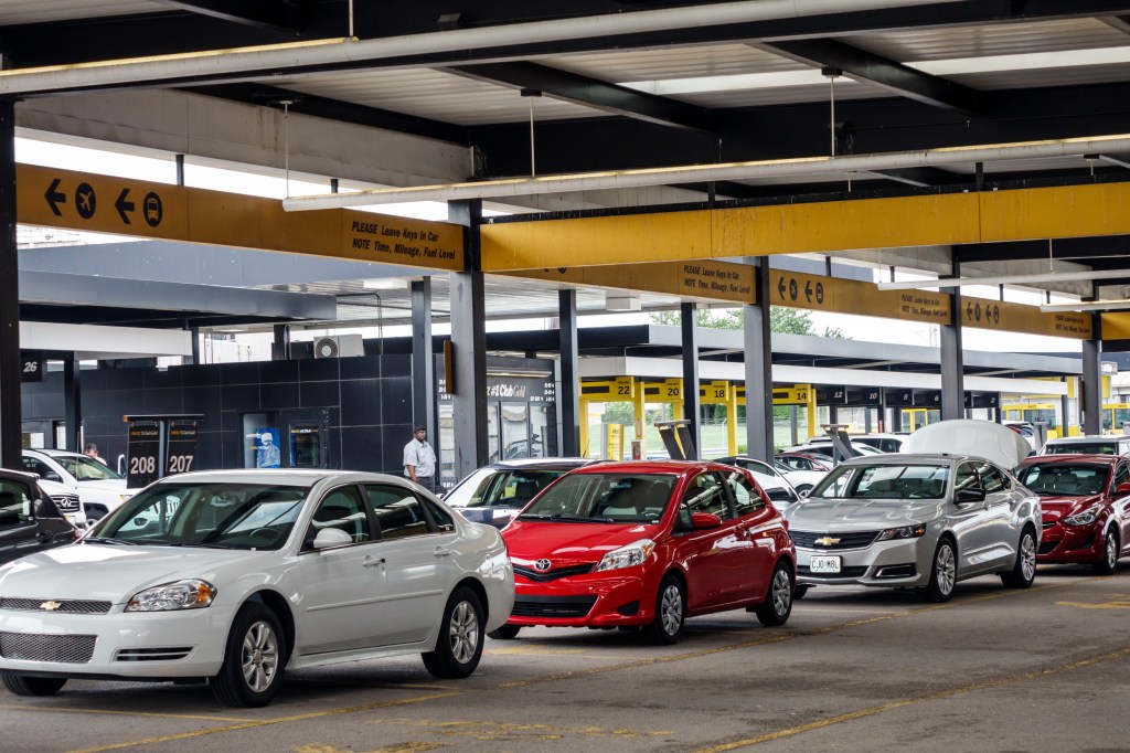 Rental cars waiting in line