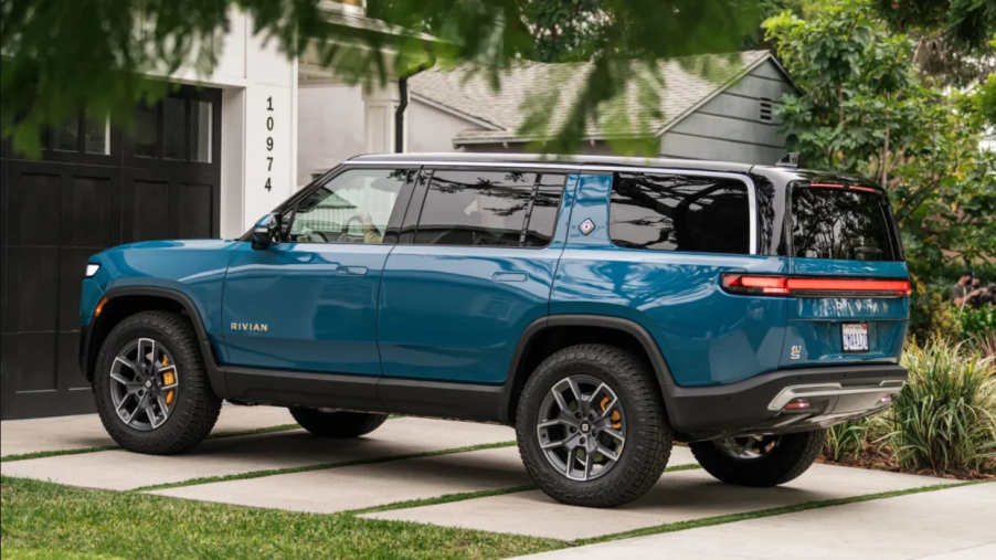 Rivian Blue 2022 Rivian R1S parked in a driveway