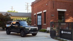 Rivian R1T electric truck parked outside of Rivian HQ. Rivian IPO and Rivian stock price may be affected by negative press regarding human rights issues
