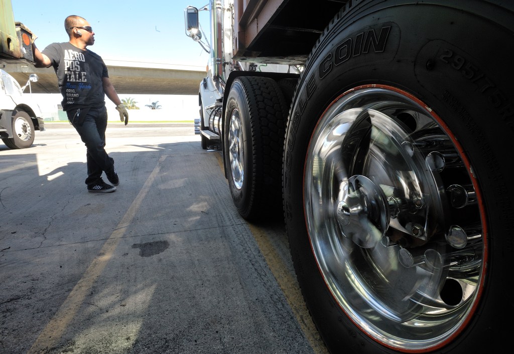 Spiked semi-truck wheels