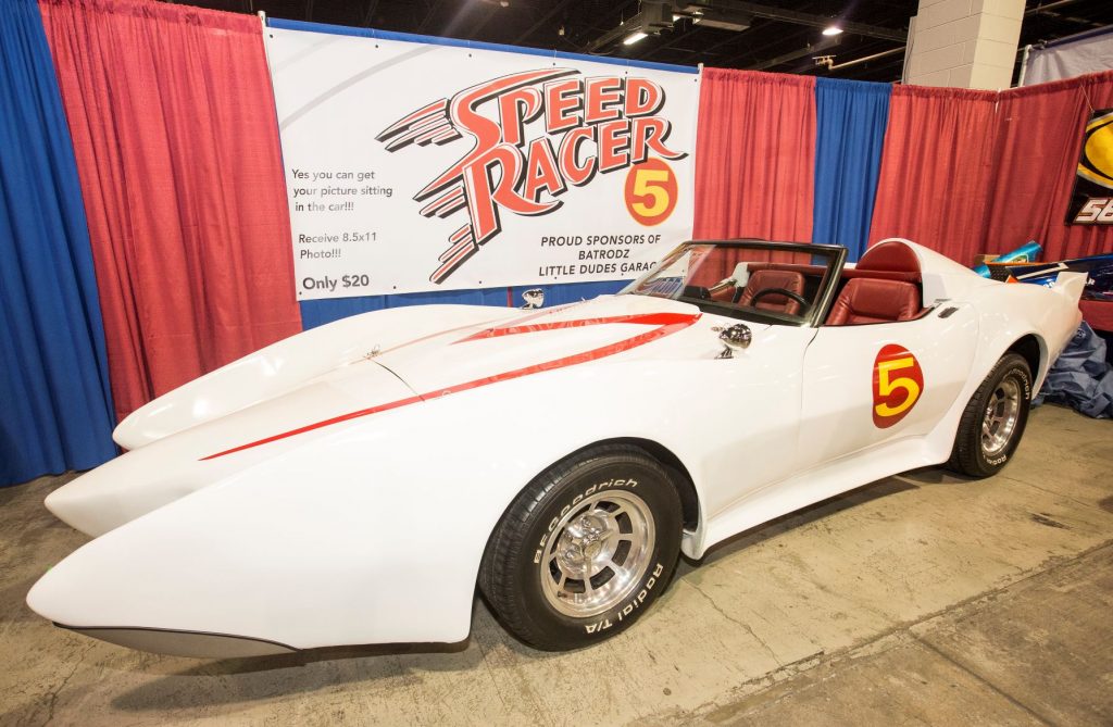 Speed Racer's Mach 5 parked by some curtains