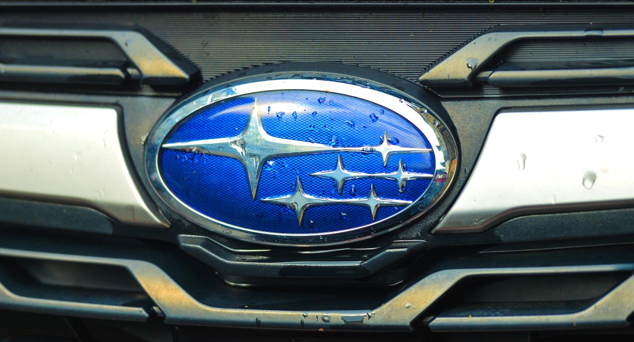 A blue Subaru logo.