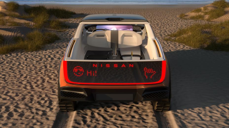 A side view of the futuristic-looking orange Nissan Surf-Out.