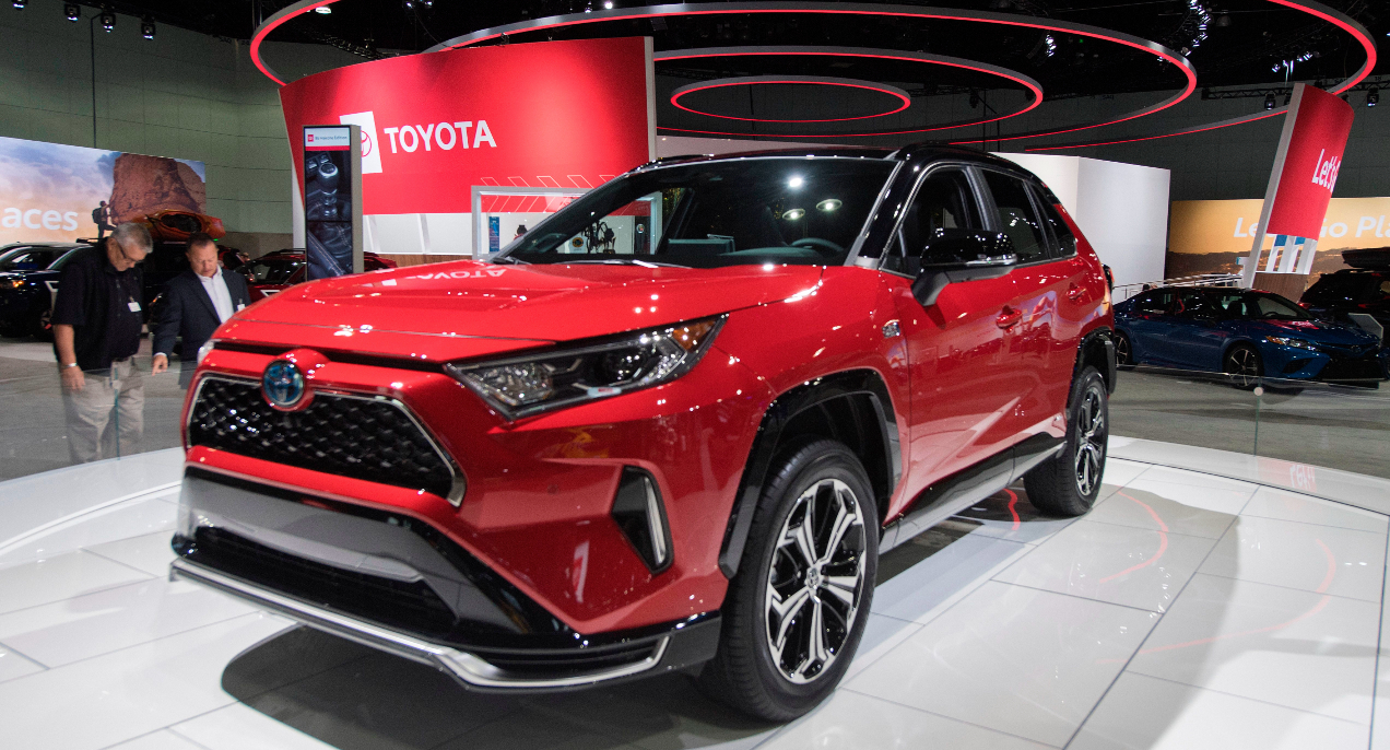 A red 2021 Toyota RAV4 Prime on display