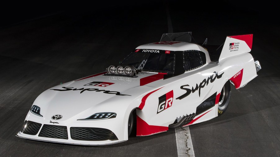 Toyota GR Supra NHRA Funny Car drag racer in a white red and black livery