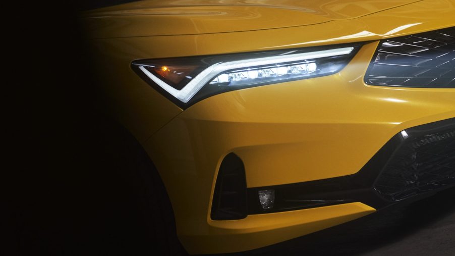 The headlight of the new Acura Integra in yellow