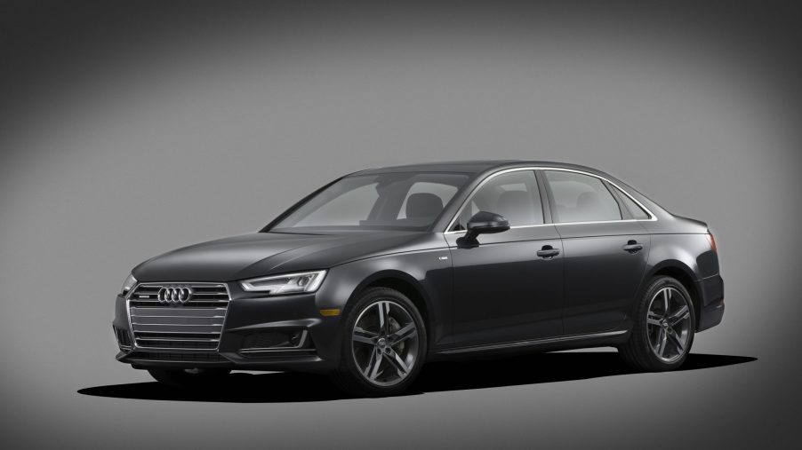The Audi A4 in grey, a solid certified pre-owned buy, shot from the 3/4 angle in a photo studio