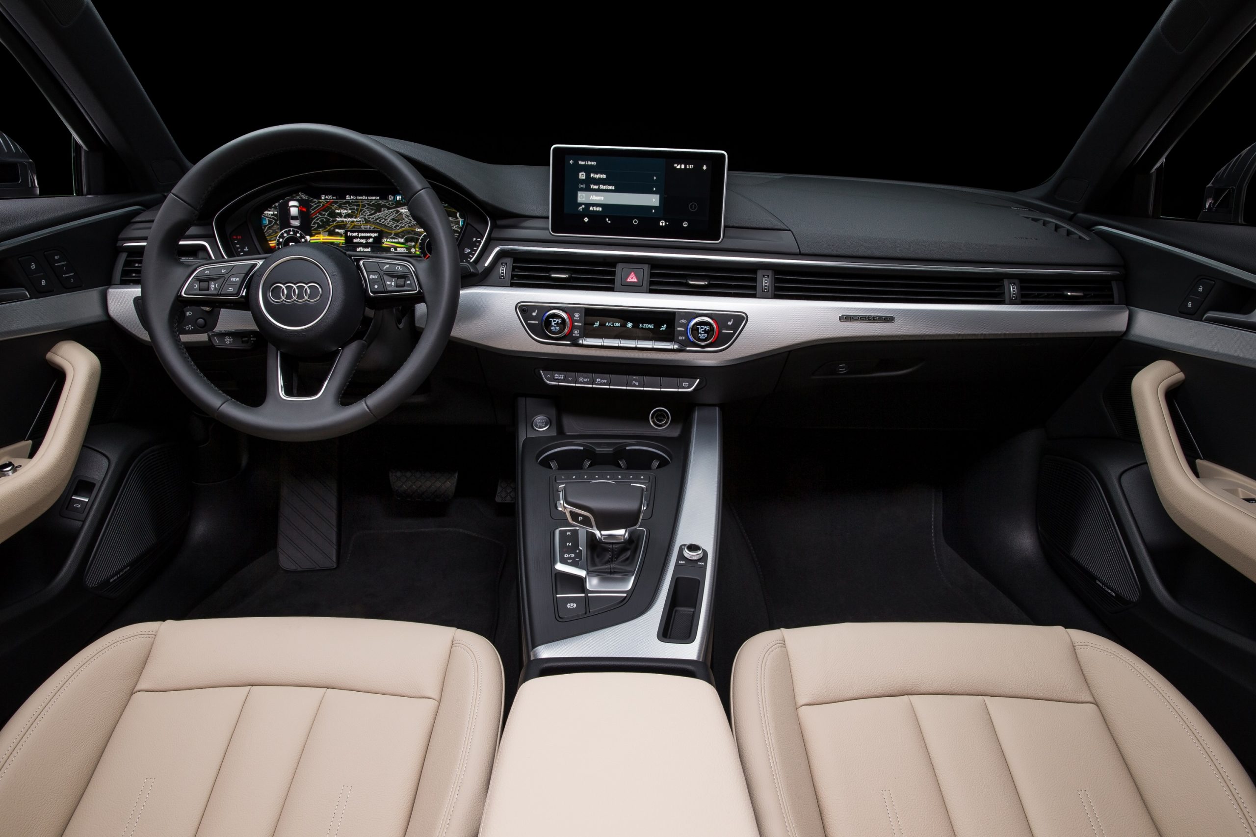 The black and beige interior of the new Audi A4