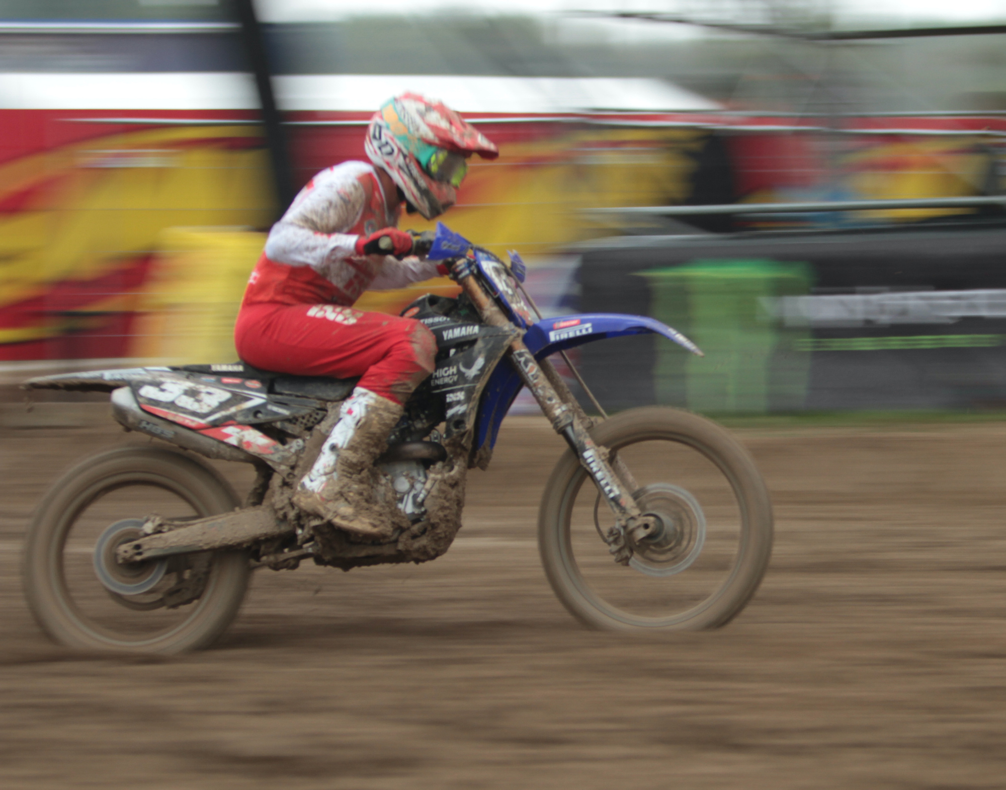 a dirt bike racing in action