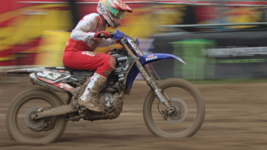 a dirt bike racing in action