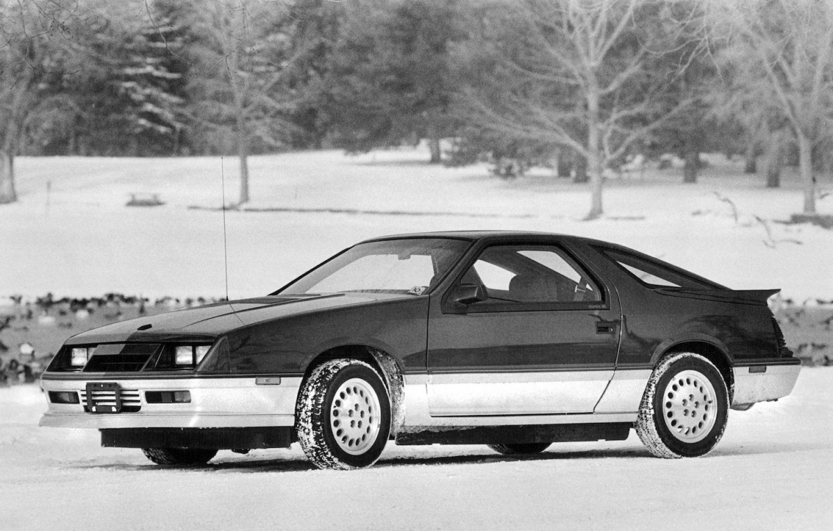 1985 Dodge Daytona parked in the snow.