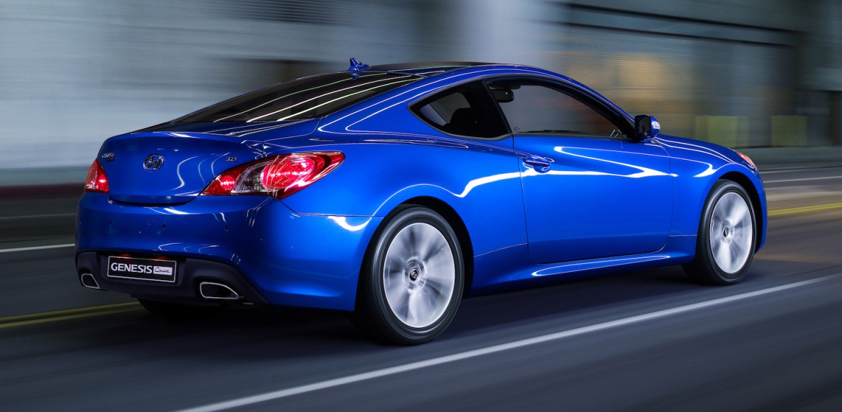 Hyundai Genesis Coupe driving on a street