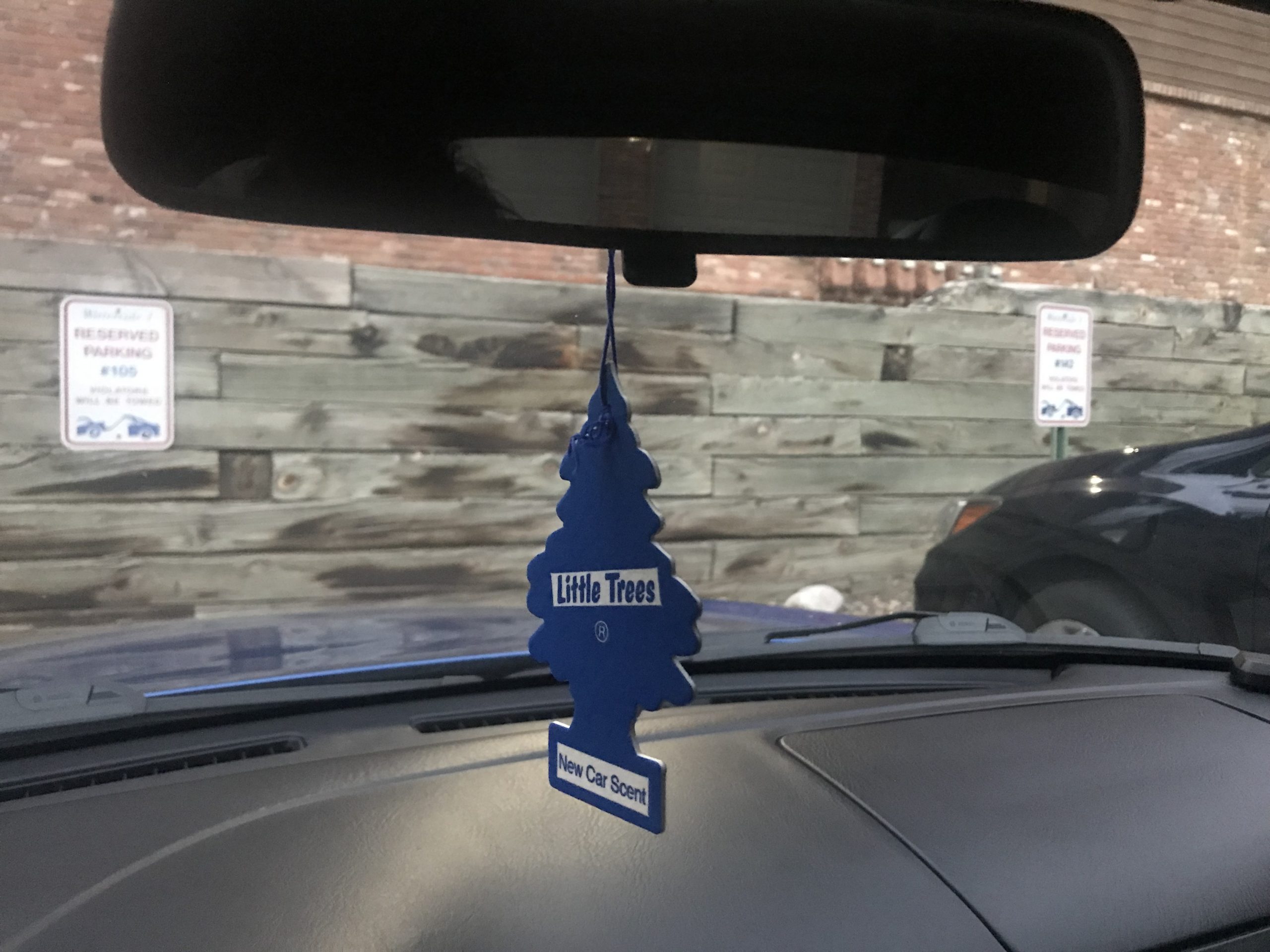 Little Tree air freshener hanging from a mirror