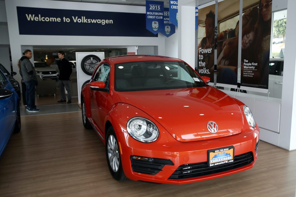  A brand new Volkswagen Beetle is displayed in the showroom at Serramonte Volkswagen.