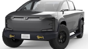 A dark gray EdisonFuture pickup truck against a white background.