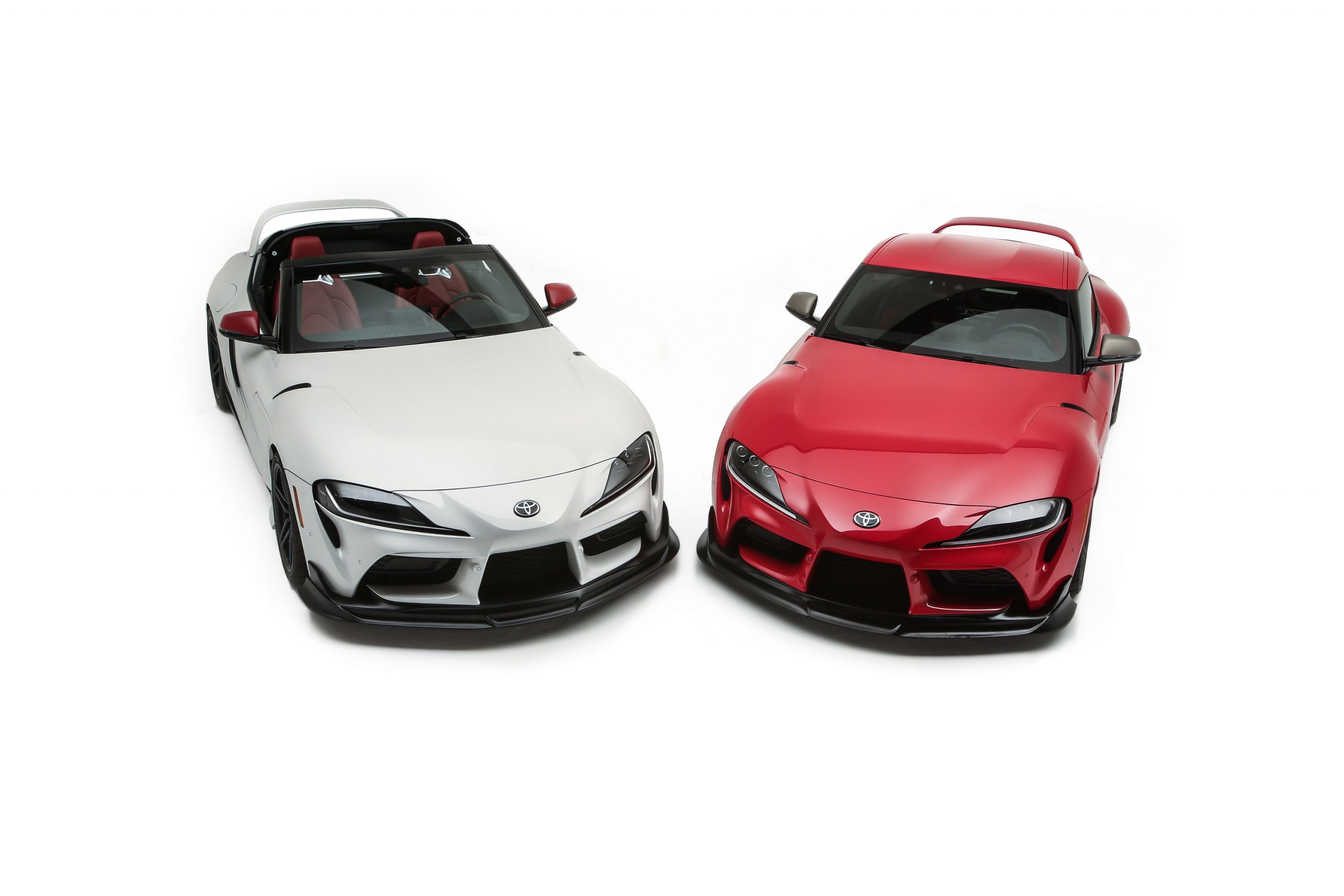 The front of two new Supra Heritage models in white and red respectively, made for SEMA 2021
