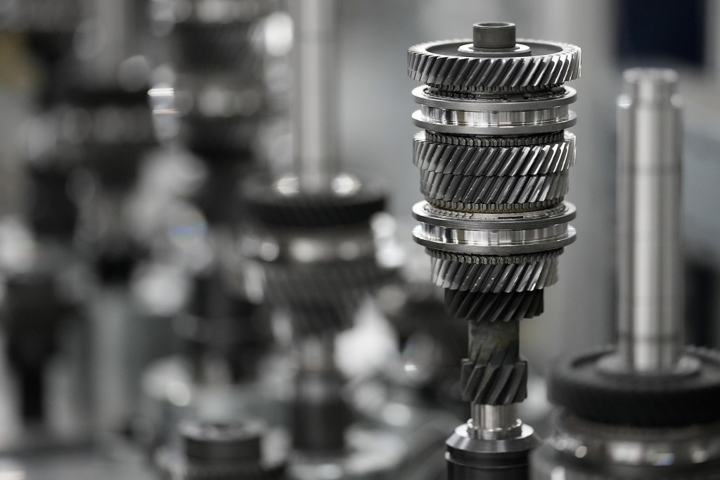 Transmission gears are seen on the assembly line at the Halewood Ford transmission assembly plant