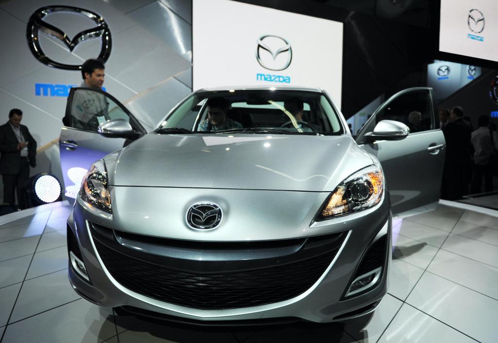 The new Mazda 3 is unveiled during the Los Angeles Auto show, November 19, 2008, in Los Angeles, California.