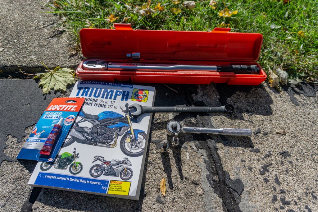 The tools used to install handlebar risers on a 2012 Triumph Street Triple R