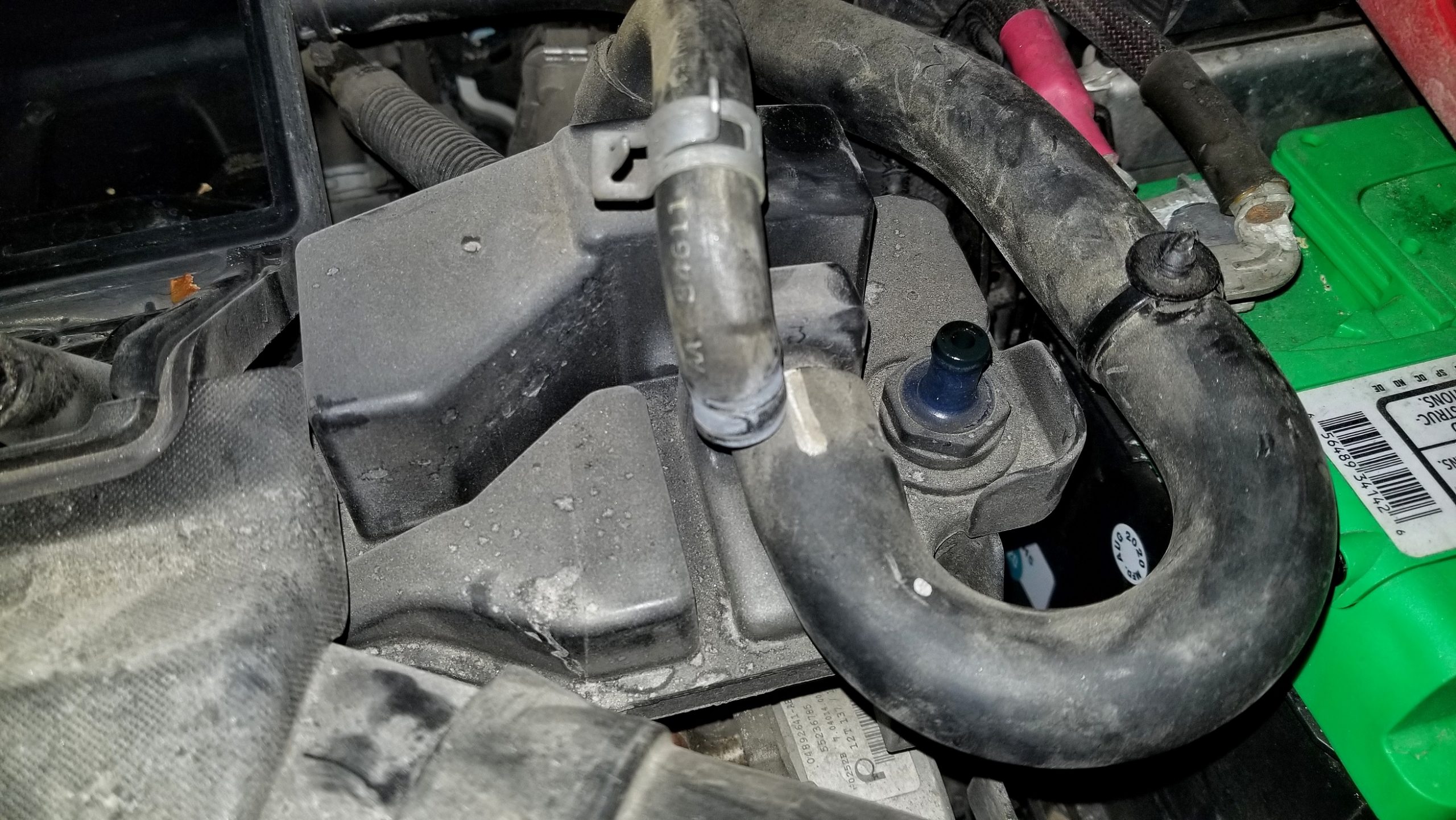 The oil separator and PCV valve in a 2013 Fiat 500 Abarth