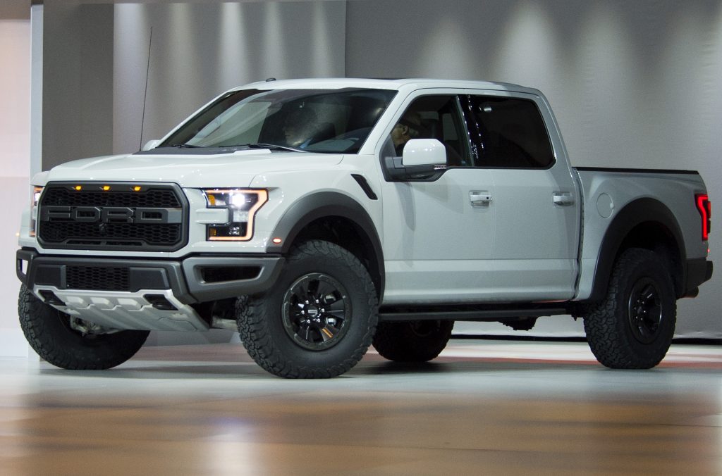 A white 2016 Ford F-150 Raptor pickup truck at the US Auto Show press conference, Kanye West sold his Raptor fleet.