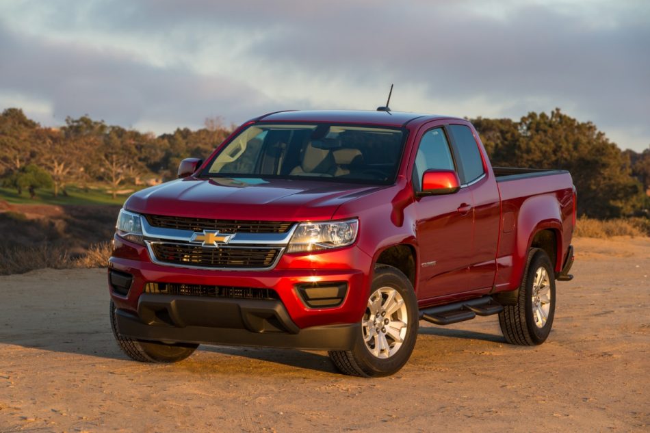 A red 2017 Chevy Colorado on a plain.
