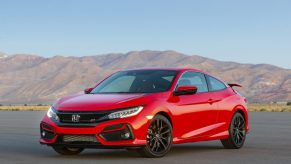 A red 2020 Honda Civic Si shot from the front 3/4