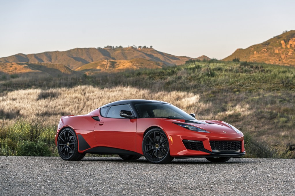 A red 2020 Lotus Evora GT amongst the California hills