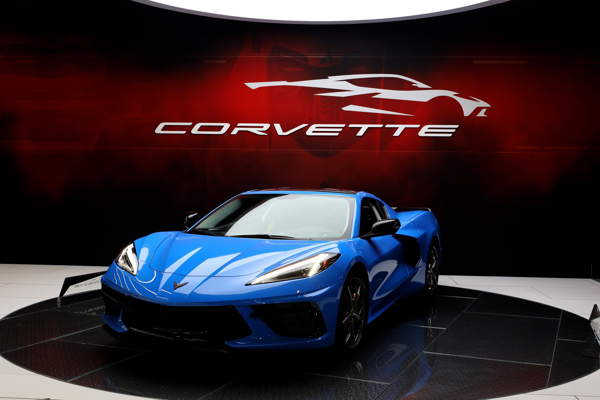 A blue Chevrolet Corvette sports car shot from the front 3/4