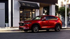 A 2021 Mazda CX-5 compact SUV with the Soul Red Crystal Metallic paint color option