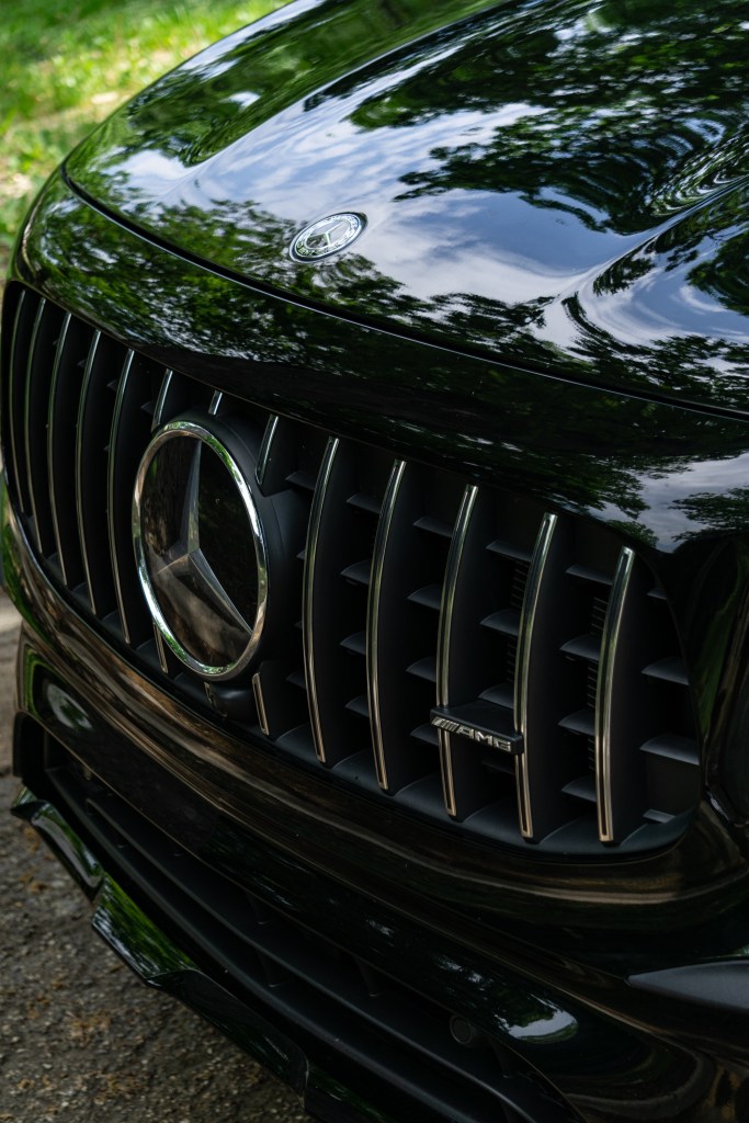 A close-up view of a black 2021 Mercedes-AMG GLB 35's grille
