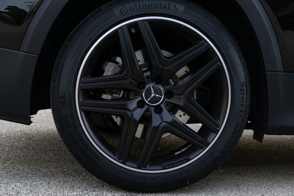 The 2021 Mercedes-AMG GLB 35's optional black 20" rear wheel and brake